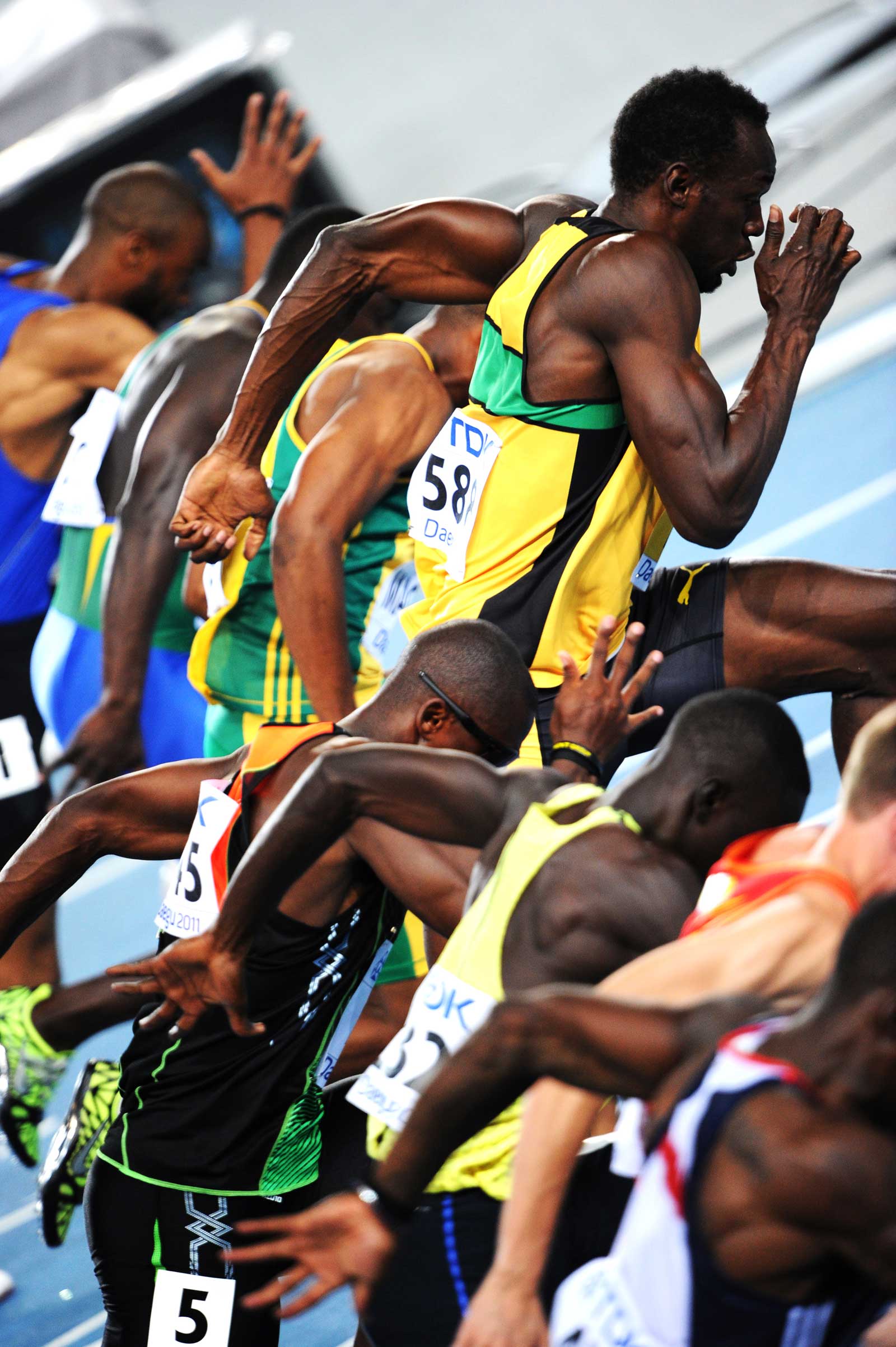 2011年8月27日　世界陸上大邱大会　男子100m予選　ウサイン・ボルト（ジャマイカ）／他の選手に比べ、頭ひとつ、いや二つくらい大きなボルト。スタートも圧倒的な瞬発力で他の選手を退けていた。
