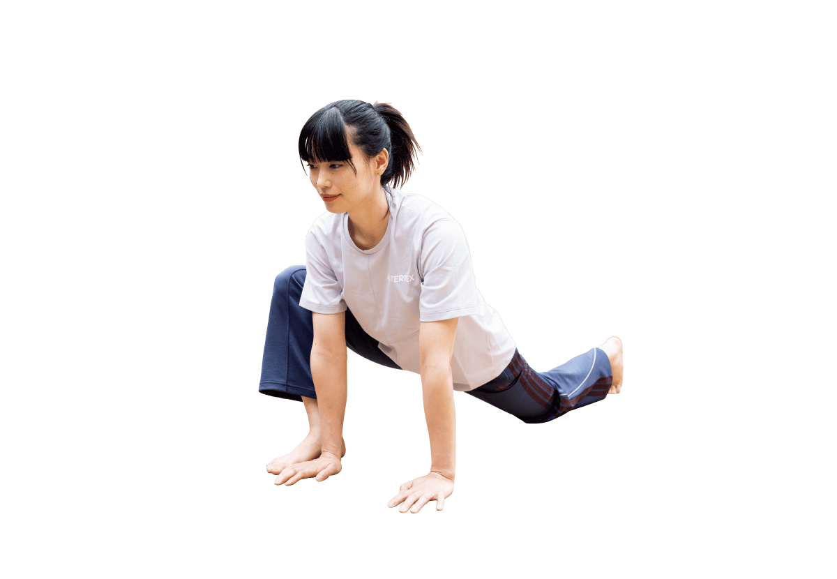 床に手をつき片足を肩の下まで持っていく画像