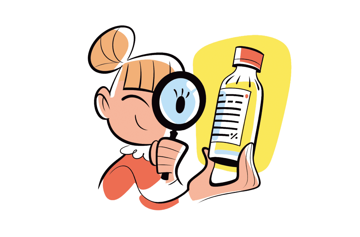 飲み物のラベルをチェックしている女性