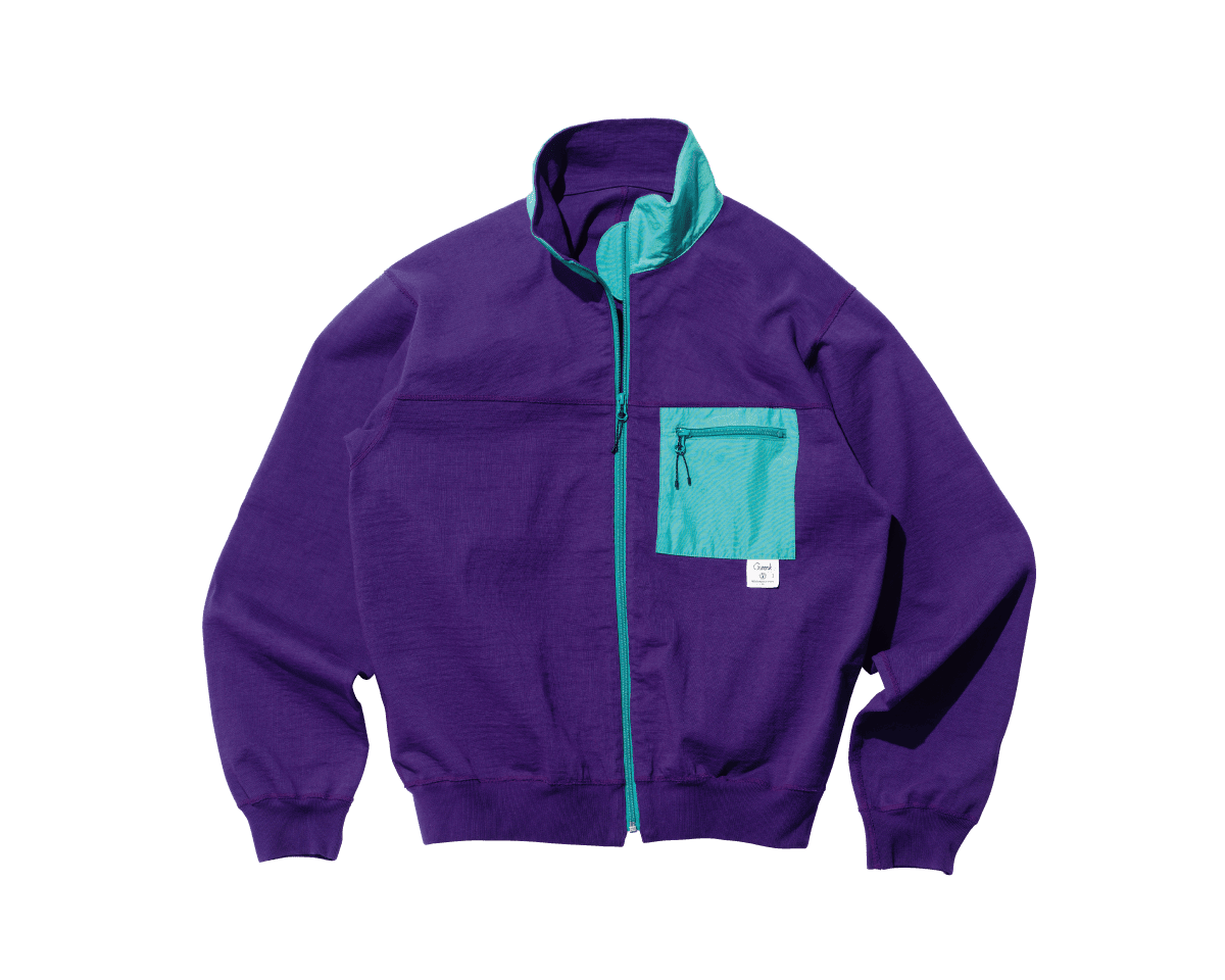 配色と素材感がレトロな〈Gurank〉のカーディガン。