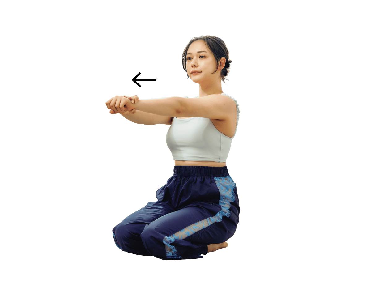 村重杏奈さんが僧帽筋のストレッチをしている様子